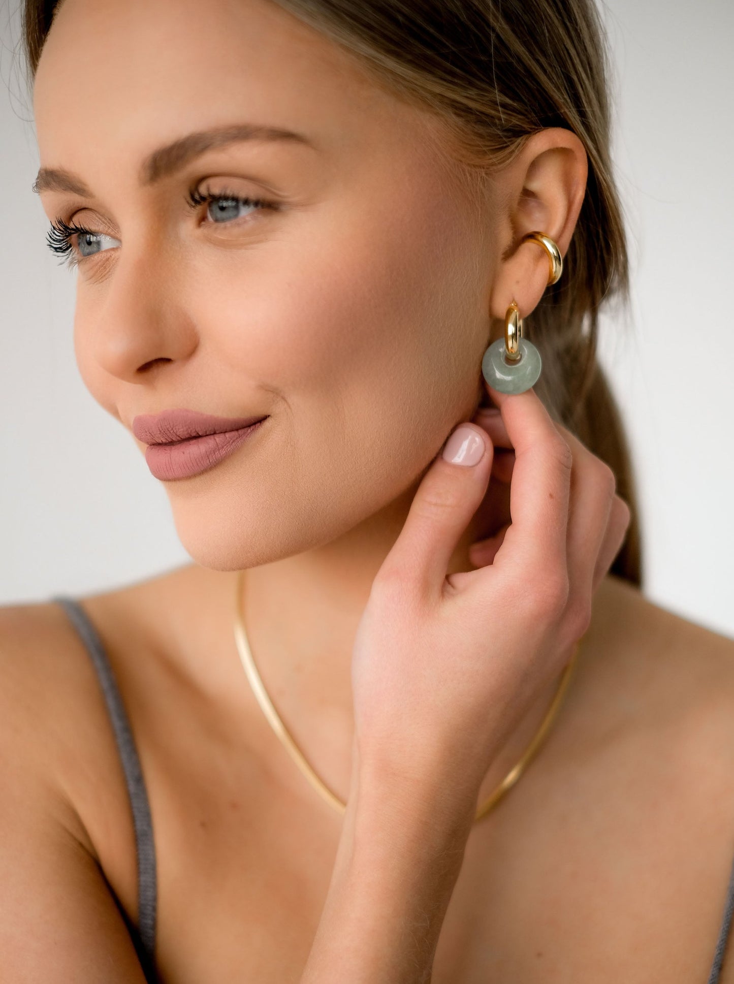 SILVER HOOPS WITH GREEN STONE