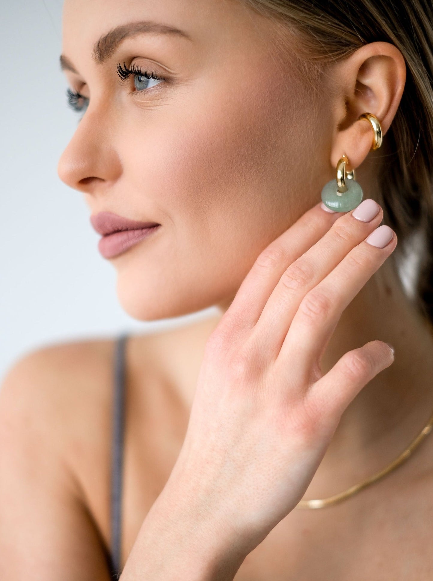 GOLD-PLATED HOOPS WITH GREEN STONE